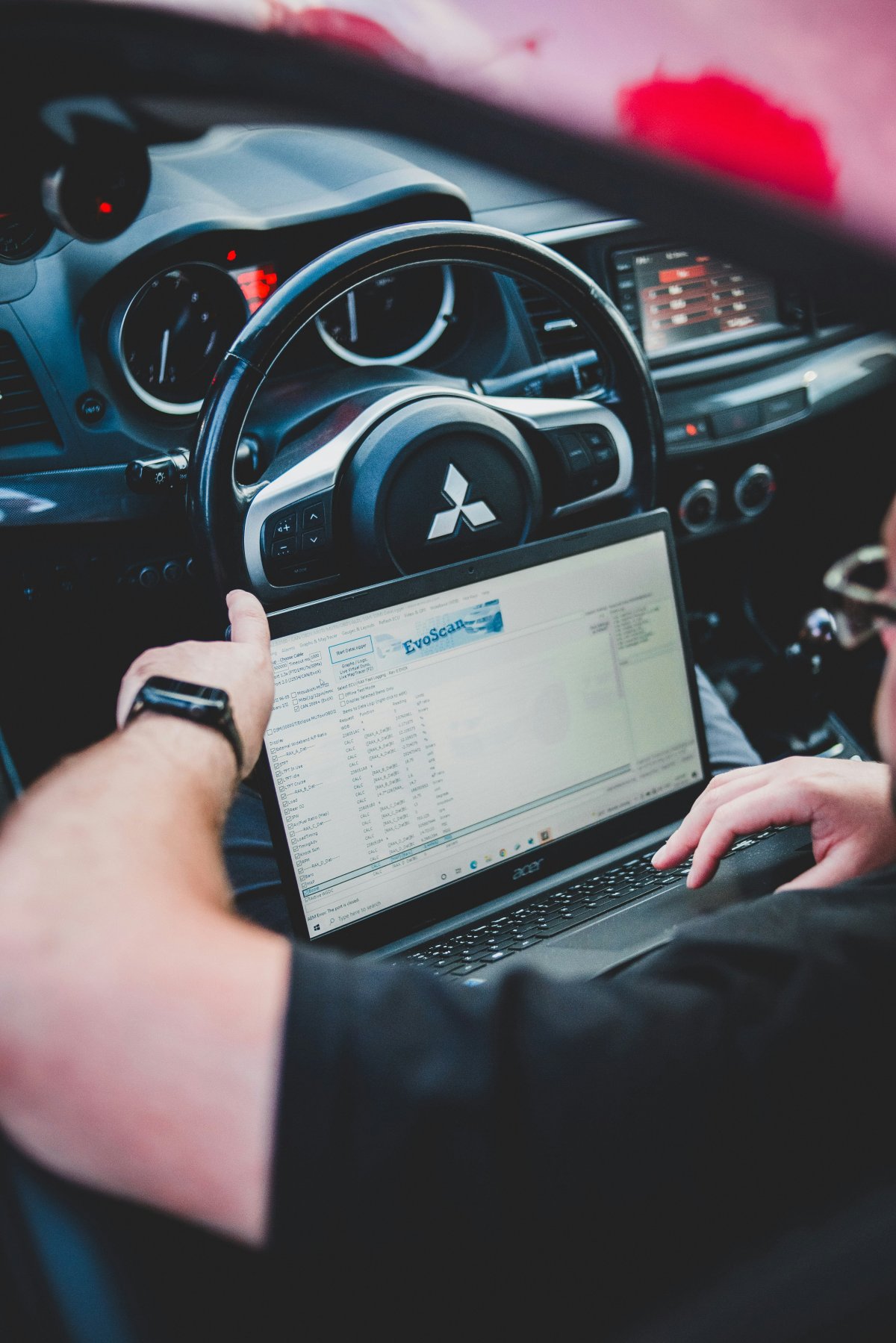 Diagnostic technique d'un véhicule d'occasion sur pont élévateur